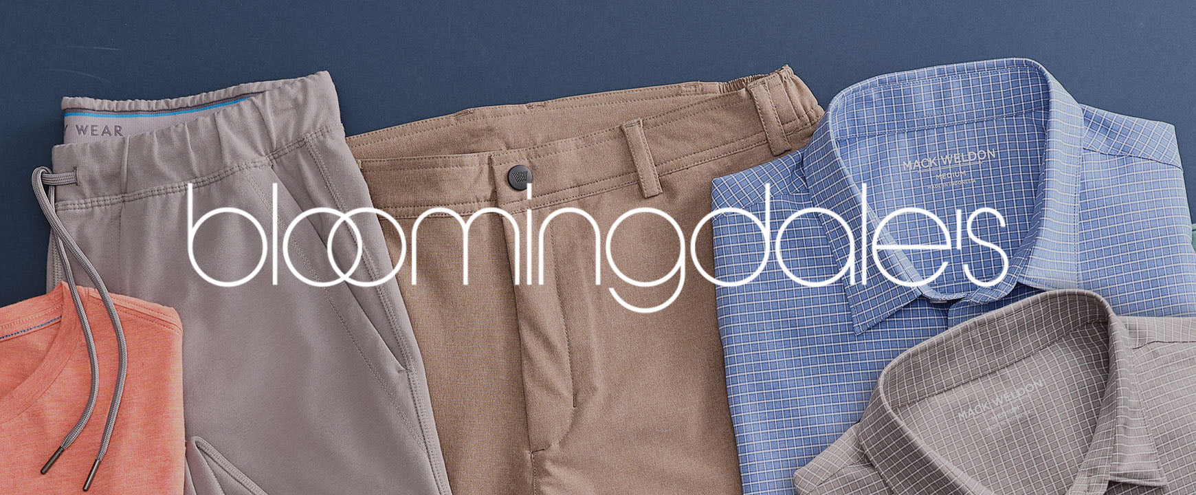 Image with tops and pants laid out with a "BLOOMINGDALES" logo across the image